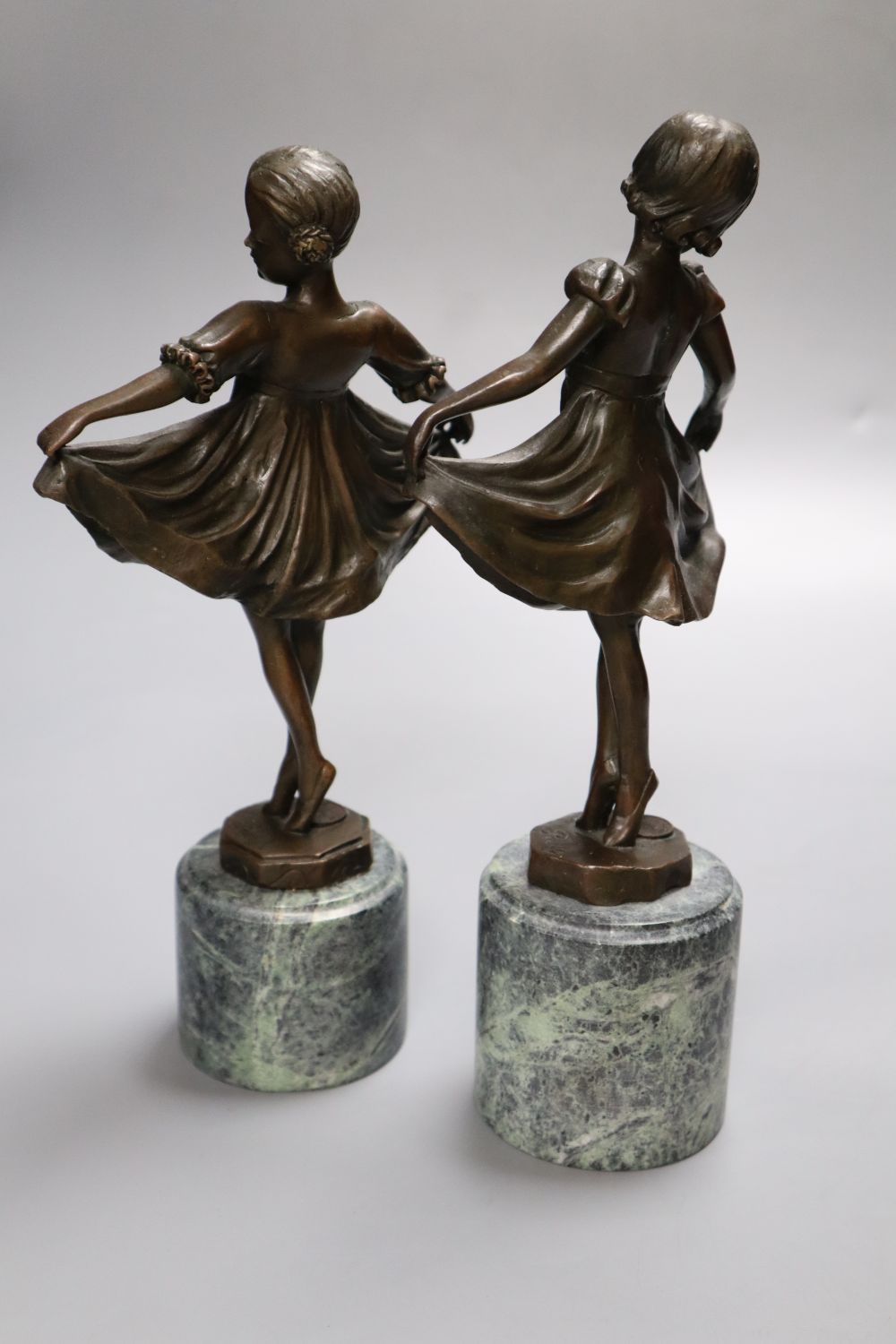 After Preiss - A pair of modern French bronzes of dancing girls, on marble plinths, 26cm high